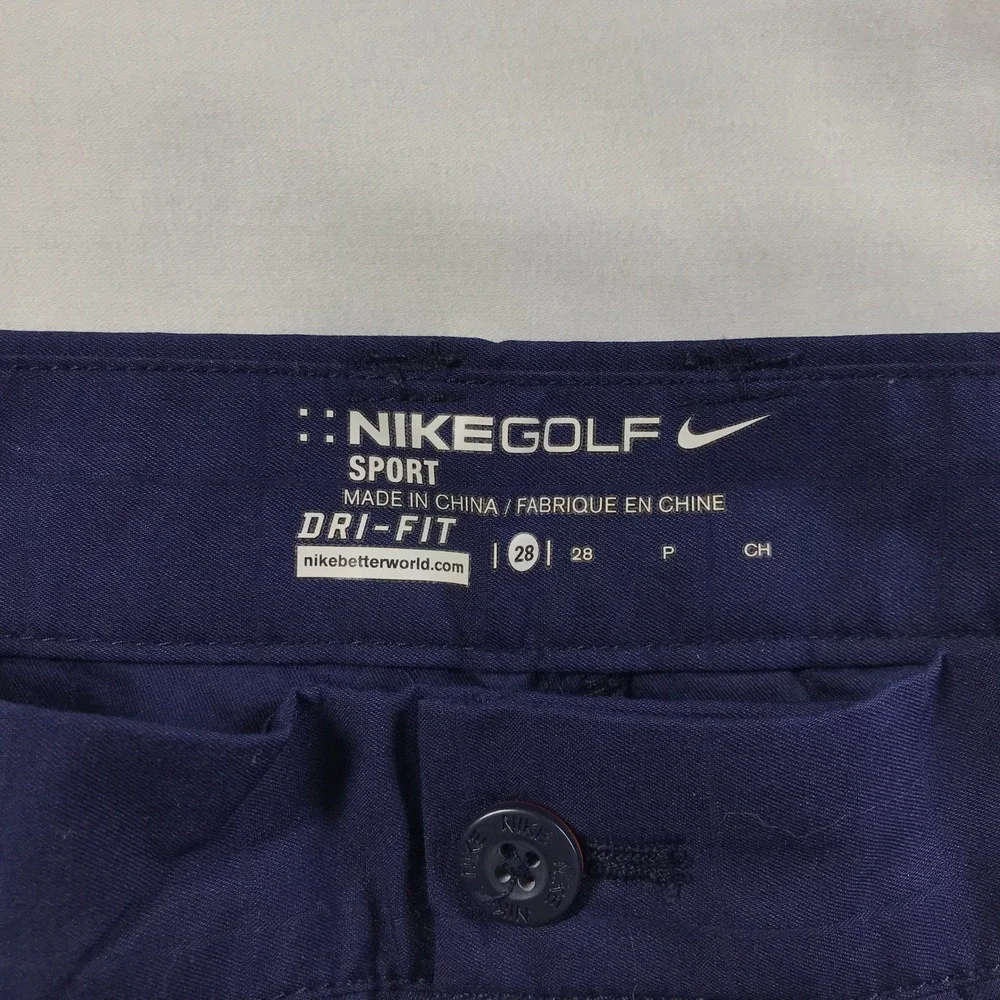 Nike Men's Navy Cargo Pants with Orange Swoosh Accent